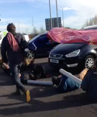 protesters-blocking-road-at-lights